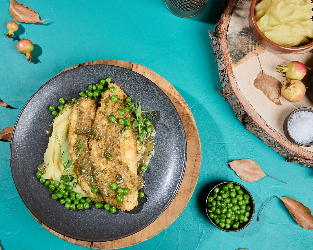 Dover Sole Fillet a la Meuniere served with Mashed Potatoes and Sautéed Peas
